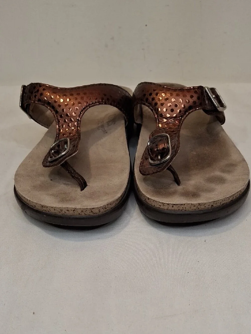 SAS Sanibel Metallic Bronze Gold Thong T Strap Sandals with Gold Buckle Detail.